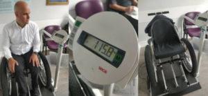 Mark and the weelchair on the scale